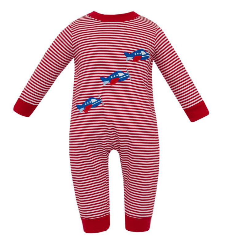 Red and white striped baby onesie with blue airplane designs on a white background